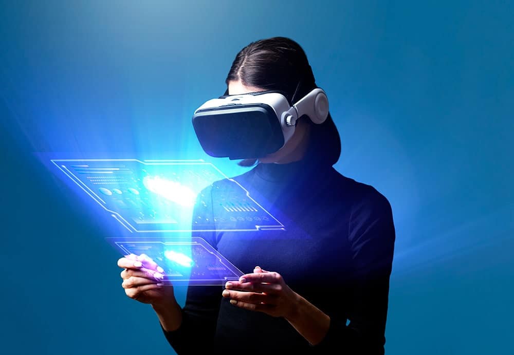 A lady reading message using VR headset and illustrating the importances of technology translation services