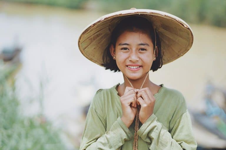 image showing Burmese lady smiling illustrating the importance of Burmese translation services