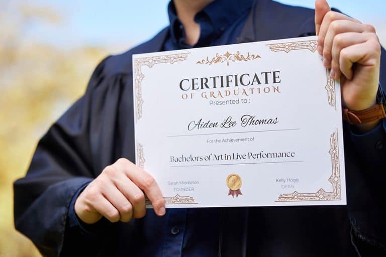 A man holding an education certificate illustrating the importance of education translation services