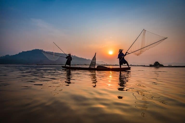 Fishermen in Laos illustrating the importance of Lao translation services